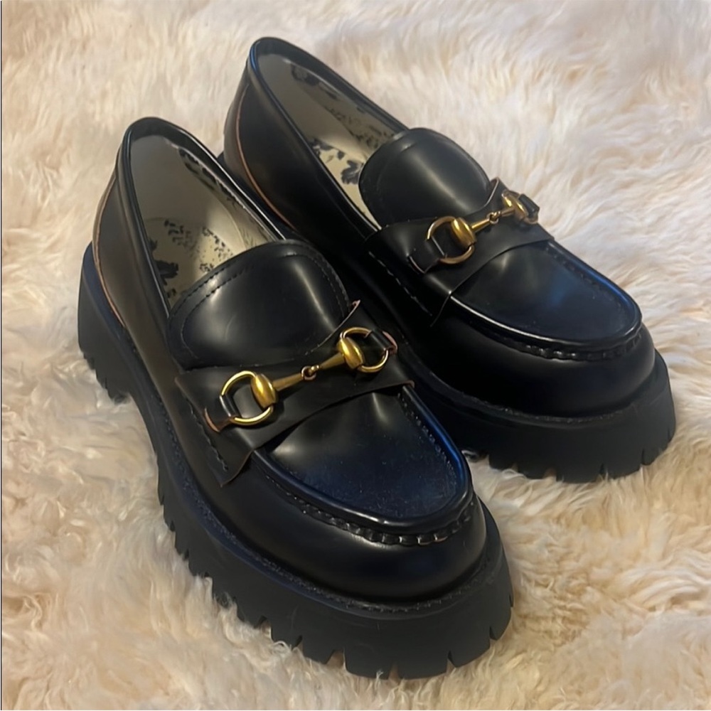 Elegant Black Loafers with Gold Accents